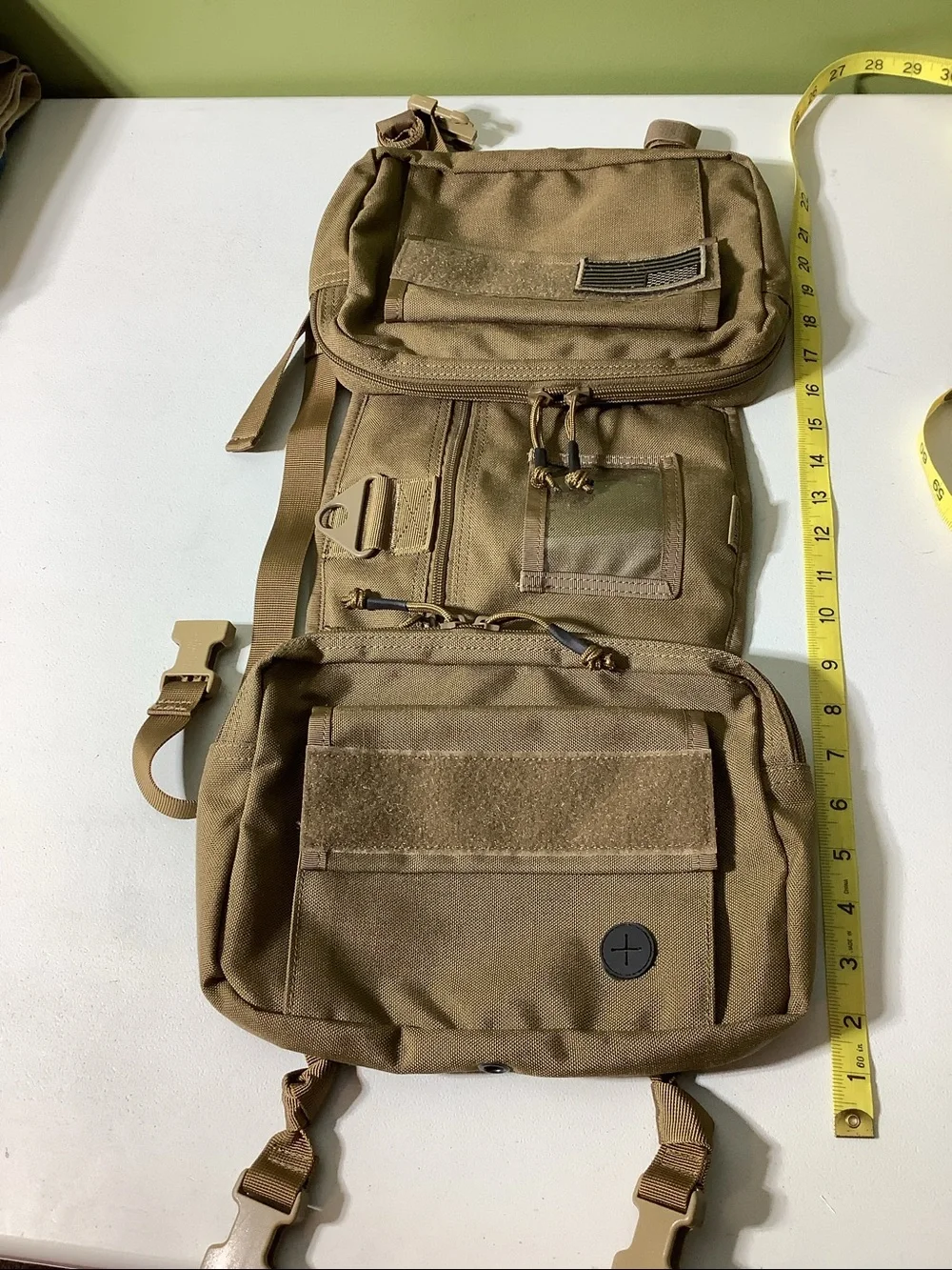 One Tigris khaki tactical pack for dogs